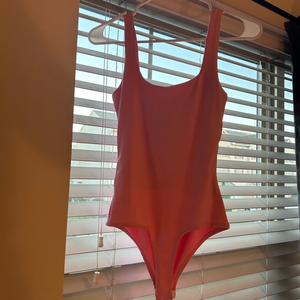 Pink bodysuit